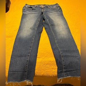 Torrid crop boyfriend jeans with frayed hem. Size 10